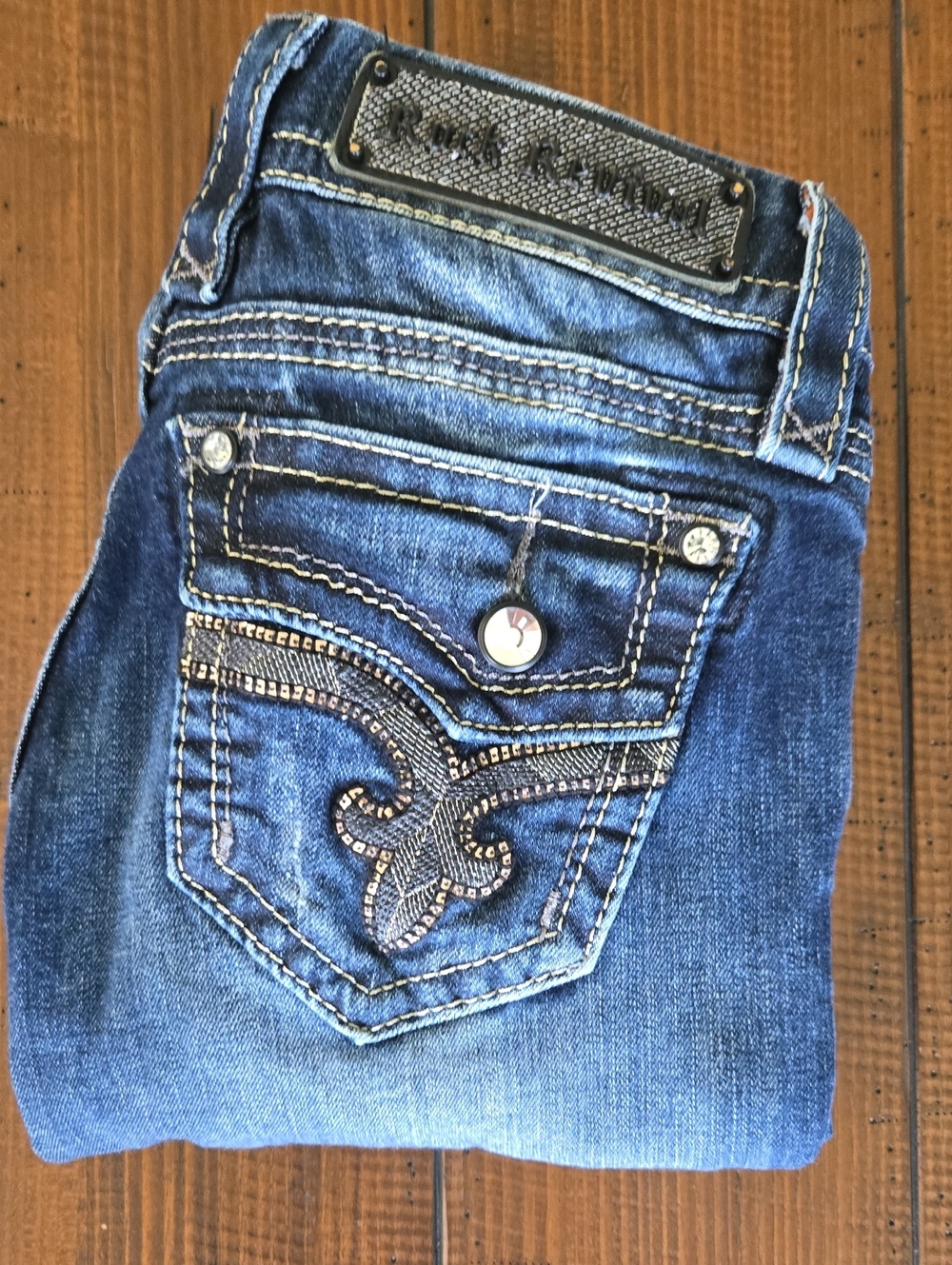 Rock Revival Women's Dark Blue Boot Cut Jeans with Embellished Back Pocket